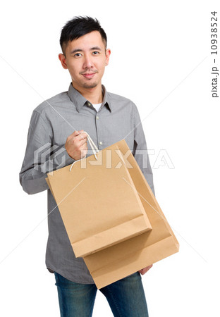Happy Asian man shopper Happy Asian man shopper 10938524