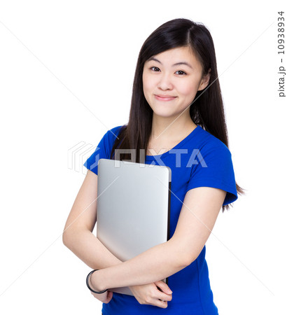 Asia woman holding computer Asia woman holding computer 10938934