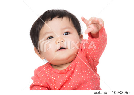 Asian baby girl finger pointing up Asian baby girl finger pointing up 10938965