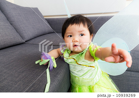 Asia baby girl with halloween party dressing 10939269