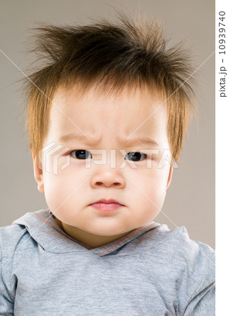 Serious baby boy 10939740