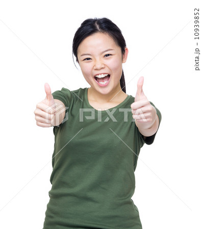 Excited asian woman two hand with thumb up 10939852