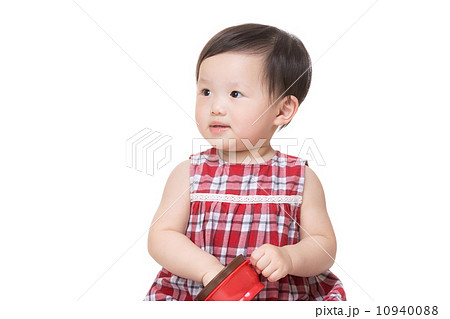 Asian little girl with snack box Asian little girl with snack box 10940088