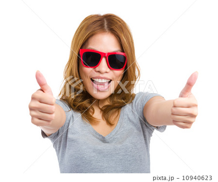 Young woman showing thumb up Young woman showing thumb up 10940623