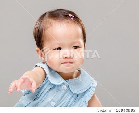 Little girl pulling hand up 10940995