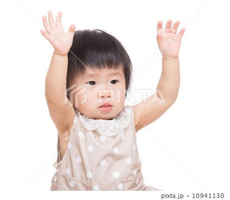 Asia baby girl two hands up Asia baby girl two hands up 10941130