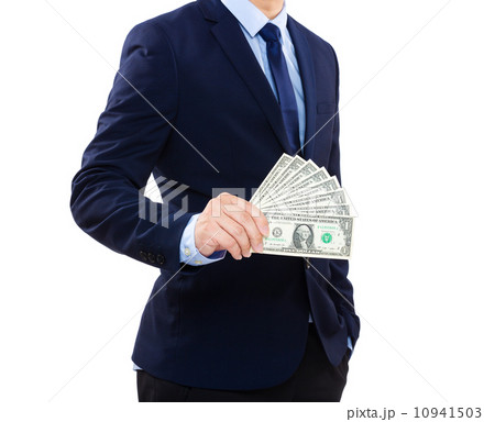 Businessman showing cash Businessman showing cash 10941503