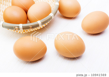 Brown egg over linen background Brown egg over linen background 10941569