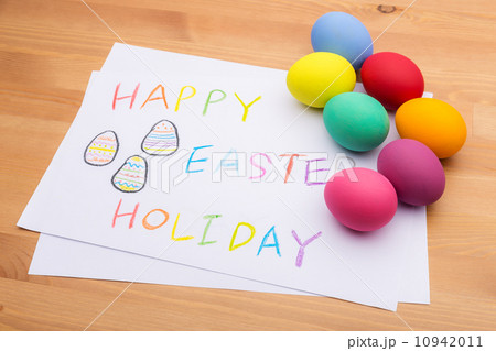 Painted easter egg and kid drawing 10942011