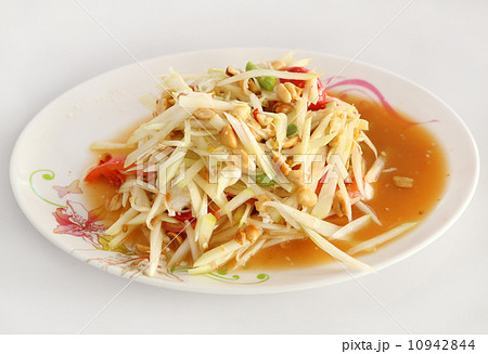 papaya salad on white table 10942844
