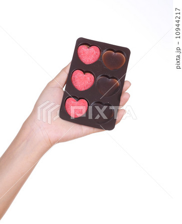 hands holding heart candy hands holding heart candy 10944217