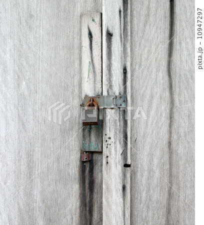 locked old wooden door locked old wooden door 10947297