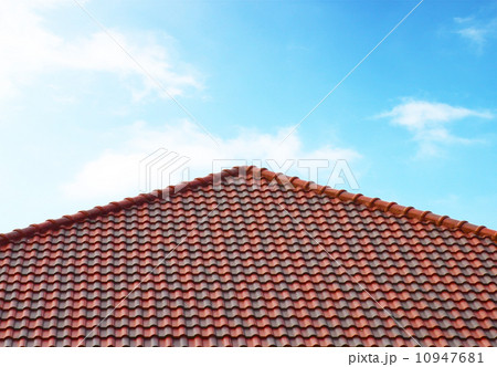brick roof with clear cloud blue sky 10947681