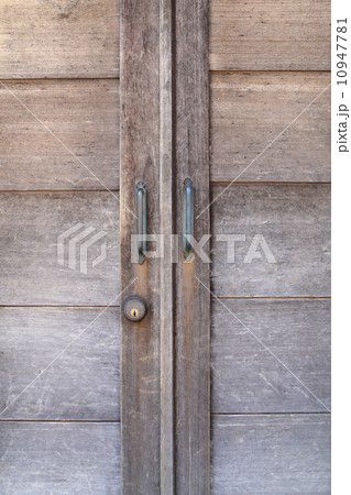Handle on wooden door Handle on wooden door 10947781
