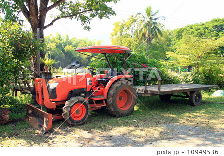 Red tractor with trailer Red tractor with trailer 10949536