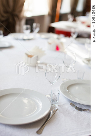 Tables set for meal 10950486