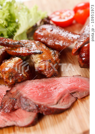 sausages on a wooden cutting board 10951973