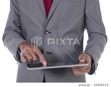 young male holding device with studio white background 10956414
