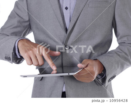 young male using ipda young male using ipda 10956428