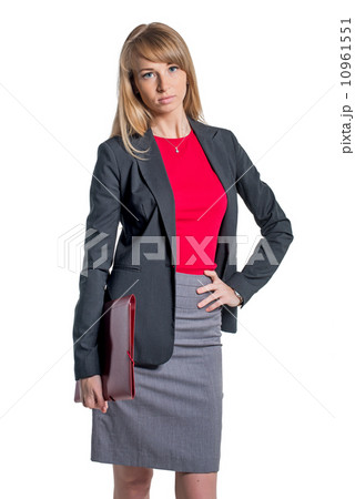 Portrait of young business woman with red folder gray skirt shirt classical costume, isolated on whi 10961551
