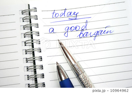 Blue and silvery pens on the note book Blue and silvery pens on the note book 10964962