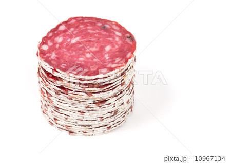 Slices of salami sausage on a white background Slices of salami sausage on a white background 10967134