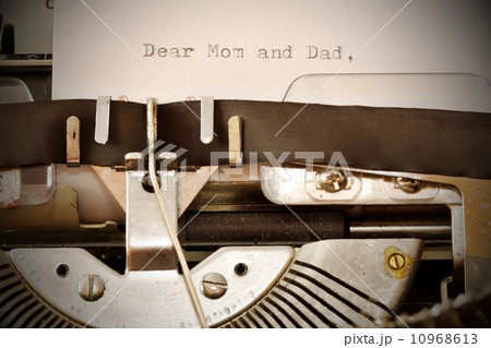 Text Dear Mom and Dad typed on old typewriter 10968613