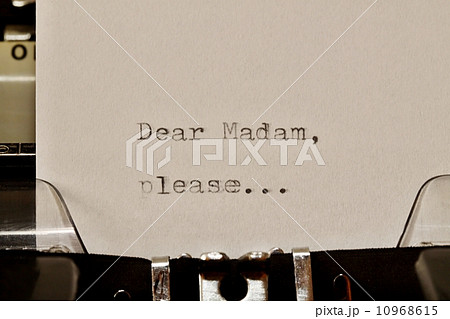 Text Dear madam typed on old typewriter 10968615