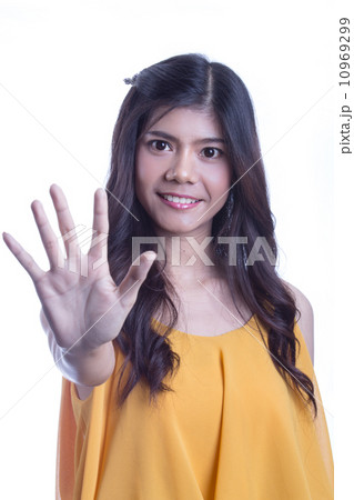 Portrait of girl showing hand Portrait of girl showing hand 10969299