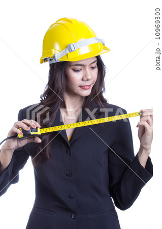 Young engineer holding a cartridge meter 10969300
