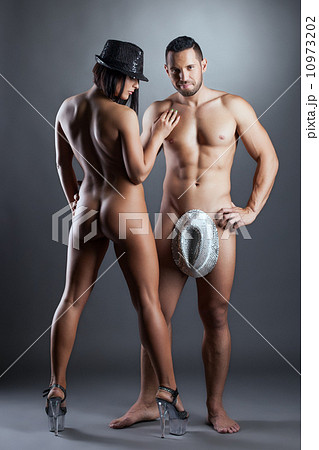 Hot young dancers posing naked in hats Hot young dancers posing naked in hats 10973202