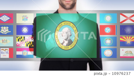 Hand pushing on a touch screen interface 10976237