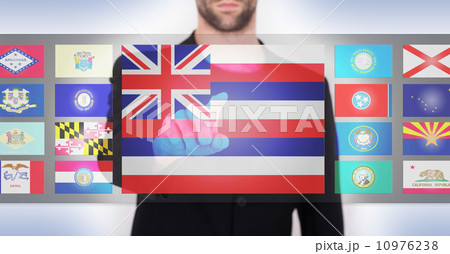 Hand pushing on a touch screen interface 10976238