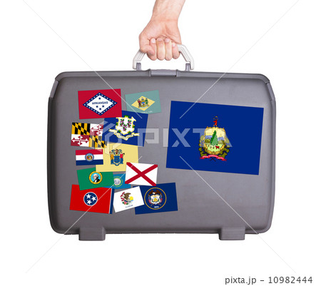 Used plastic suitcase with stains and scratches 10982444