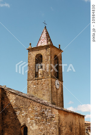 Tower of ancient fortress with a flag. Tower of ancient fortress with a flag. 10984830