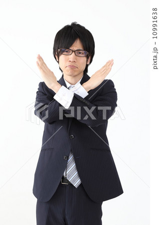 両手でバツ印をするスーツの男性の写真素材 [10991638] - PIXTA