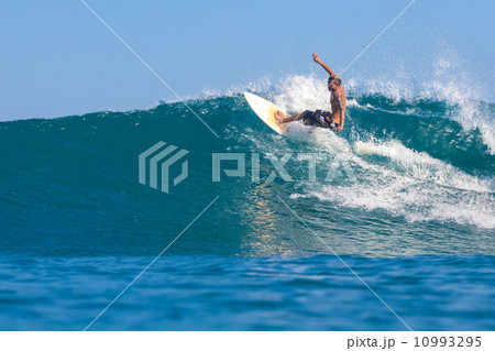 surfing a wave surfing a wave 10993295
