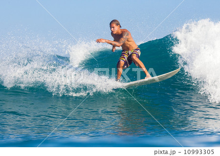 surfing a wave surfing a wave 10993305