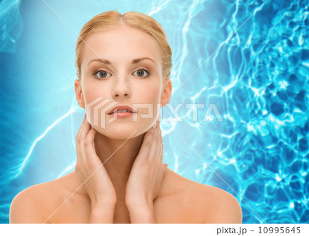 beautiful woman touching her face skin 10995645