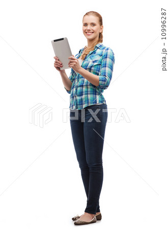 smiling girl with tablet pc computer 10996287