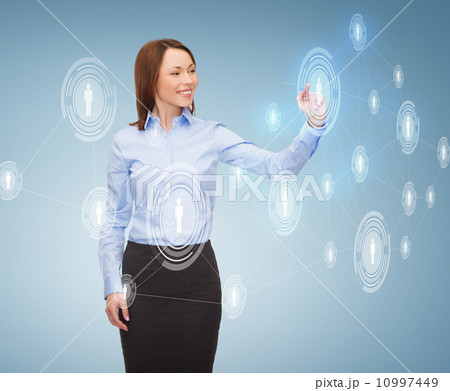 smiling businesswoman working with virtual screen smiling businesswoman working with virtual screen 10997449