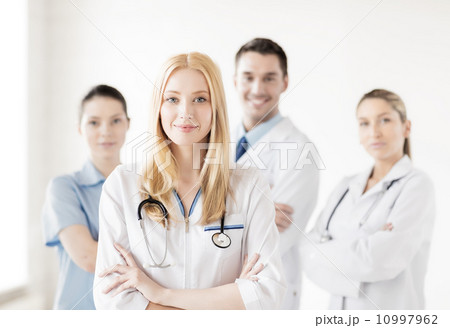 female doctor in front of medical group 10997962