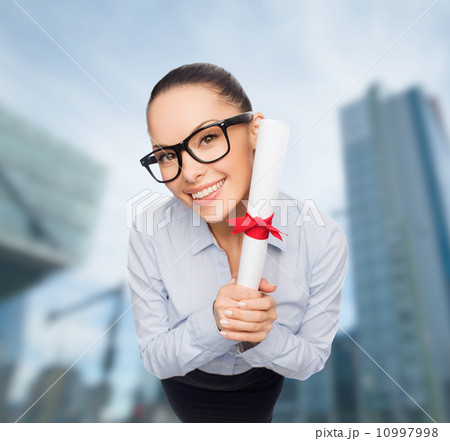 smiling businesswoman in eyeglasses with diploma smiling businesswoman in eyeglasses with diploma 10997998
