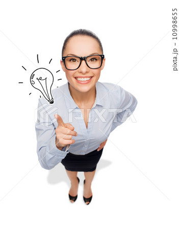 smiling businesswoman with finger up smiling businesswoman with finger up 10998655