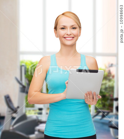 sporty woman with tablet pc sporty woman with tablet pc 10998663