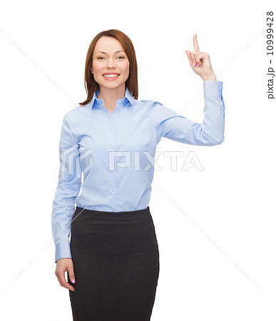 smiling businesswoman with her finger up 10999428