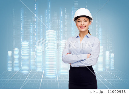 friendly smiling businesswoman in white helmet 11000958