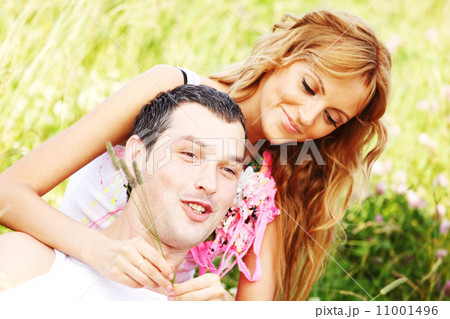 lovers on grass field 11001496