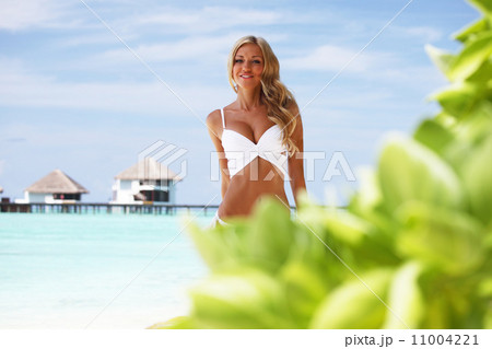 woman on tropical beach 11004221