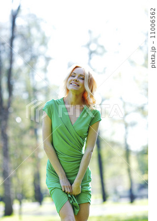 Happy woman in park Happy woman in park 11006562